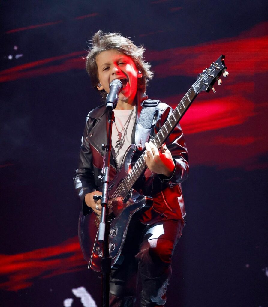 Bay Melnick Virgolino playing the guitar